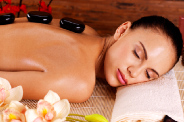 adult-woman-relaxing-spa-salon-with-hot-stones-back-beauty-treatment-therapy